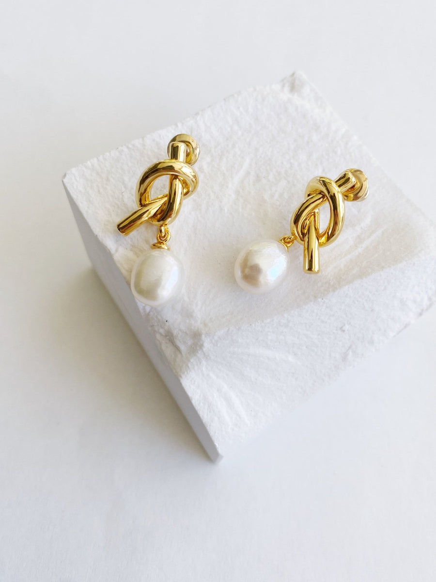 18K Gold Pearl Ear Huggie Hoops.