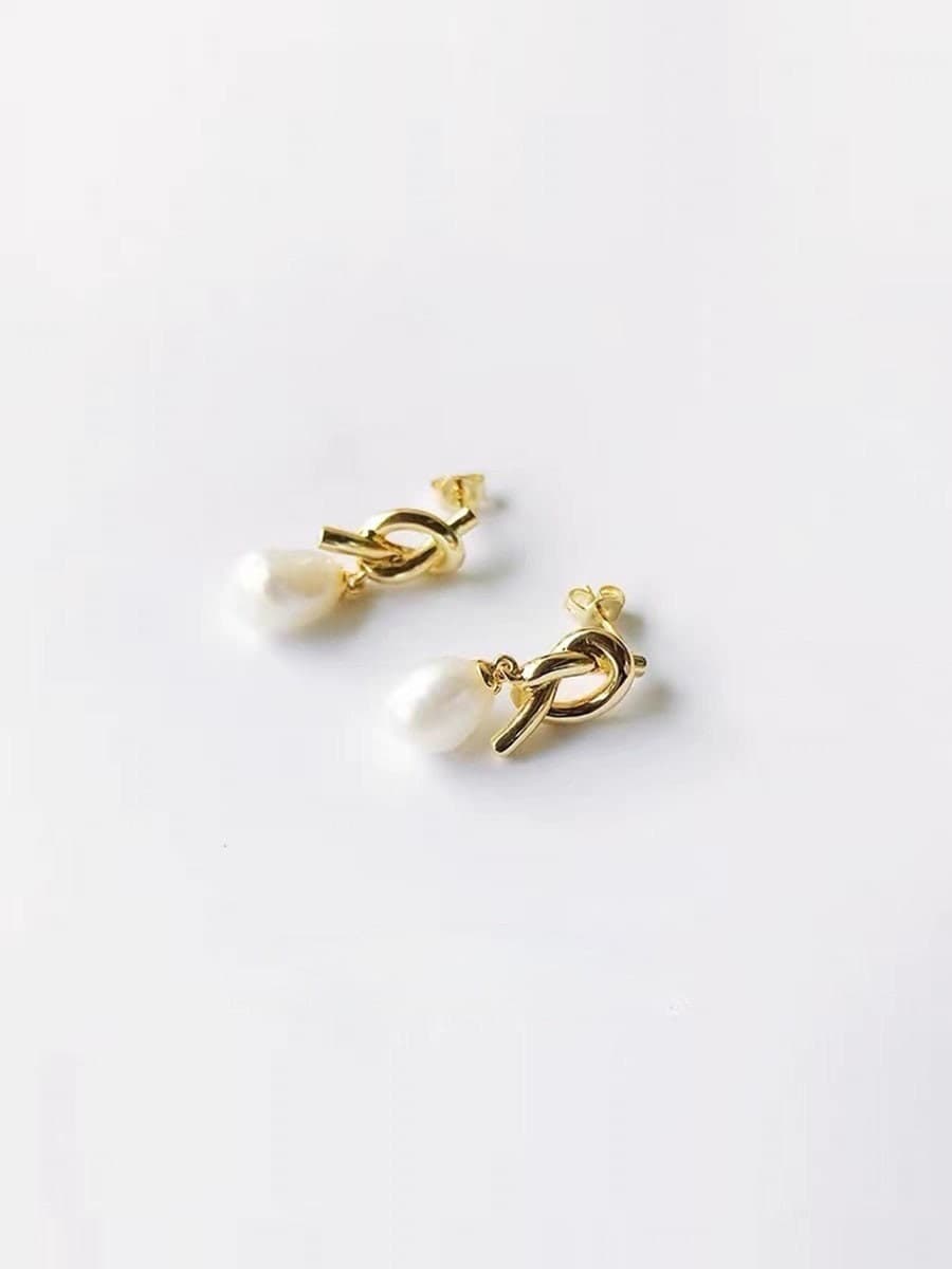 18K Gold Pearl Ear Huggie Hoops.