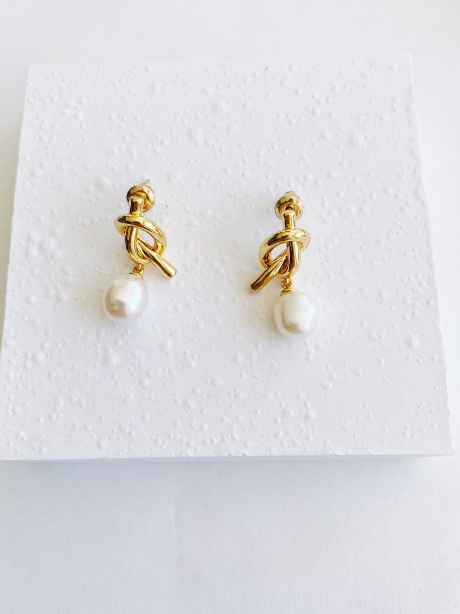 18K Gold Pearl Ear Huggie Hoops.