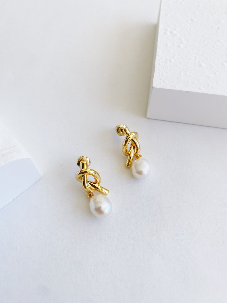 18K Gold Pearl Ear Huggie Hoops.