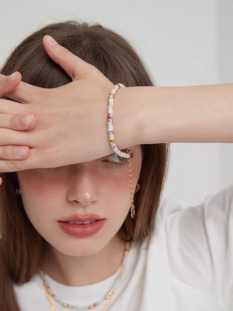 Grounding Beaded Bracelets With Gold Chain.