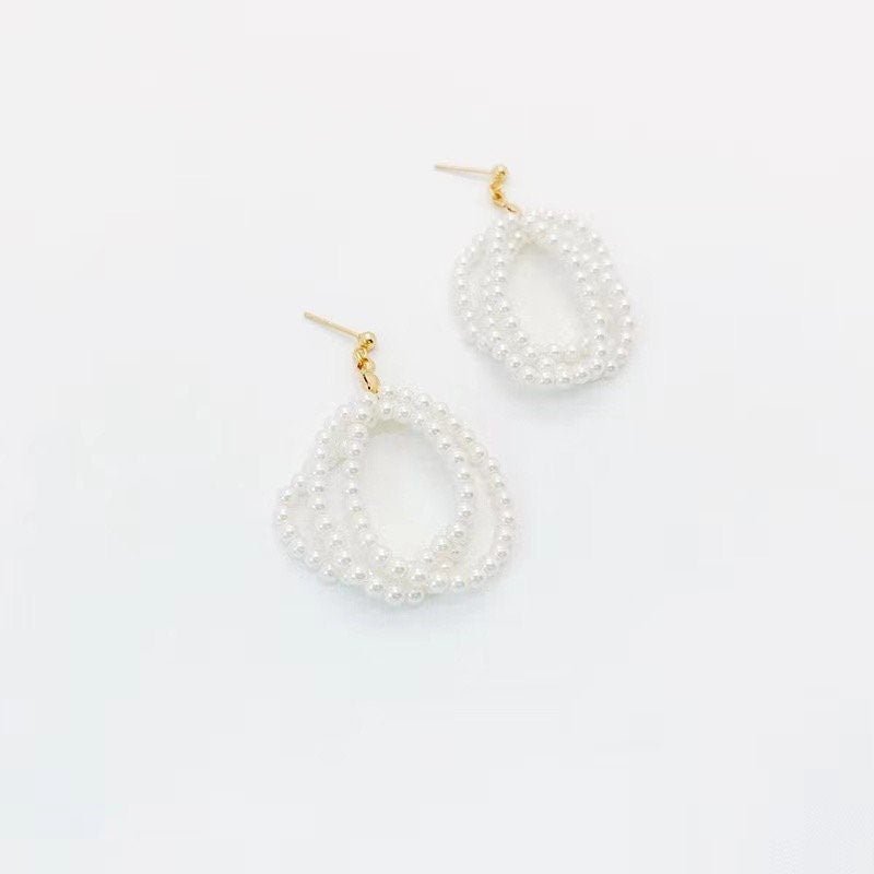 Modern Pearl Dangle Earrings.