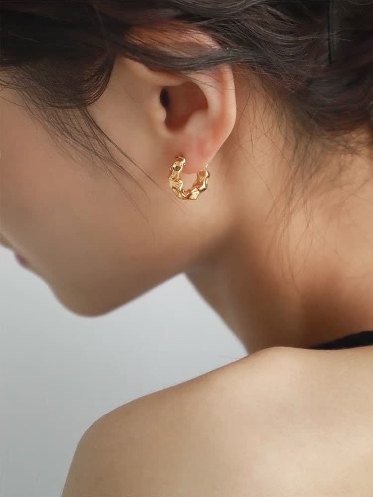 Solid Gold Huggie Hoop Earring.