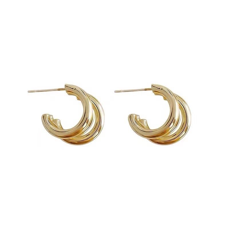Triple Hoop Pave Gold Huggie Earrings.
